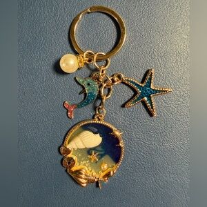 Ocean-Themed Keychain with Dolphin and Starfish and Pearl